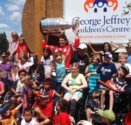 Patrick Sharp showing off the Stanley Cup to the kids at the George Jeffrey Children's Centre