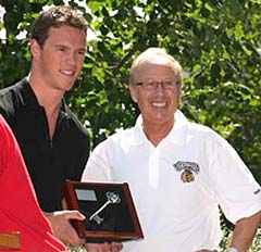 Jonathon Toews accepts the key to the city of Winnipeg from Mayor Sam Katz