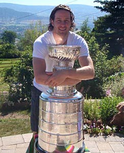 Duncan Keith sharing a moment with the Stanley Cup