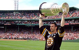 Zdeno Chara showing off the Stanley Cup at Fenway Park