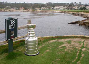 The Stanley Cup sits on the tee box of the 18th hole at Pebble Beach.