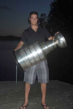 Tuukka Rask and the Stanley Cup with Lake Saimaa in the background.