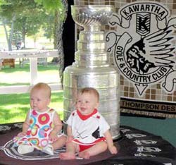 Two young fans pose for a photo with the Stanley at the Kawartha Golf & Country Club.