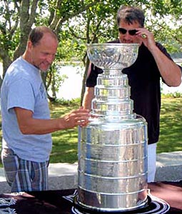 Actor Woody Harrelson and Cam Neely admiring the Stanley Cup while spending time at Martha's Vineyard.