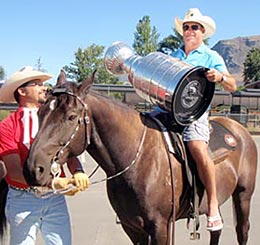 Mark Recchi and the Stanley Cup taking a ride on Maxx of the Kamloops Mounted Patrol.