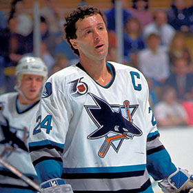 Doug Wilson finished his playing career with the San Jose Sharks, where he was the first captain of the team in their first two seasons (Doug MacLellan/HHOF).