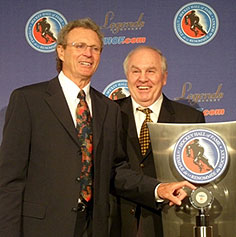 1972 Summit Series heroes Paul Henderson and Ron Ellis touch the 2010 gold medal-winning puck. 