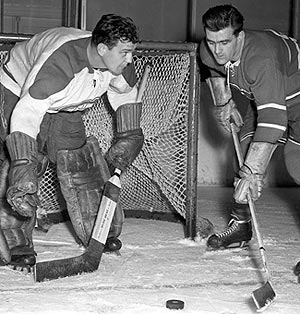 Bill Durnan wore a pair of special gloves that permitted him to catch with either hand while still holding his stick.