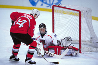 Dominik Hasek and Richard Smehlik of the Czech Republic celebrating a gold medal game win over Russia at the 1998 Olympic Winter Games in Nagano, Japan.
