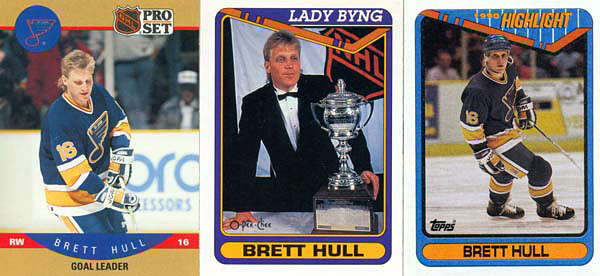 Three of Hull's hockey cards as a member of the St. Louis Blues: a 1990-91 Pro Set Goal Leader card (left), a 1990-91 O-Pee-Chee Lady Byng Winner card (middle) and a 1990 Topps  Highlight card (right).