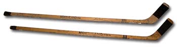 Two of Norm Ullman's milestone NHL sticks