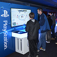 Friends become rivals while playing EA Sports NHL Slapshot at one of four Nintendo Wii gaming consoles.