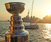 The Stanley Cup cruising Lake Ontario with the Toronto skyline in the background.