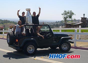 Anaheim Ducks assistant coach Newell Brown and his family celebrate with the Stanley Cup in Orange County, California.