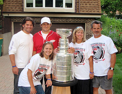 Brett Lebda and the Stanley Cup at his parents' home.