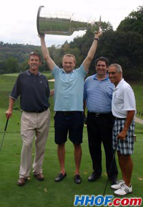 Sergei Gonchar of the Penguins proudly hoisting the Stanley Cup during the team's pre-season golf tournament.