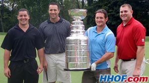 Matt Cooke of the Penguins showing of the Stanley Cup during the team's pre-season golf tournament.