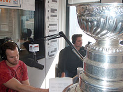 Andrew Ladd and Patrick Sharp brought the Stanley Cup for an interview with the Score 670 in Chicago