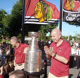 President of the Hawks John McDonough takes part in a Stanley Cup parade