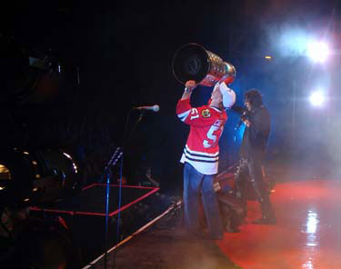Brian Campbell and the Stanley Cup on stage with Alice Cooper at Rock The Park in London, ON.