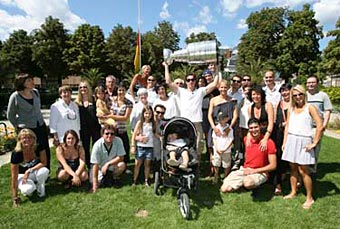 Cristobal Huet and the Stanley Cup pose for a picture with members of his family and friends in Grenoble