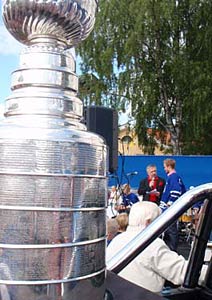 The Stanley Cup looks on as Niklas Hjalmarsson answers questions after taking Lord Stanley to the town of Eksjo where he played minor hockey