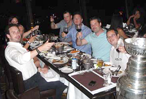 Shawn Thornton and wife Erin along with a few friends toasting the Stanley Cup at 360 The Restaurant at the CN Tower