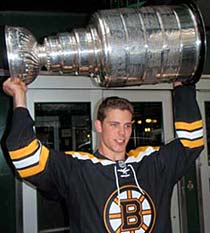 Tyler Seguin hoisting the Stanley Cup outside the Hospital for Sick Children.