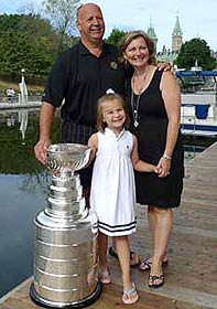Claude Julien along with wife Karen and daughter Katrina sharing a moment with Lord Stanley outside the Westin Ottawa.
