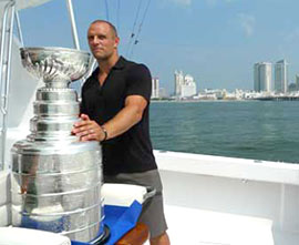 Dennis Seidenberg and the Stanley Cup out for a ride on his in-laws' boat in Atlantic City, NJ.