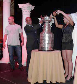 Dennis Seidenberg looks on as bottles of Ruinart champagne are poured into the bowl of the Stanley Cup at Caesar’s Palace in Atlantic City, NJ.