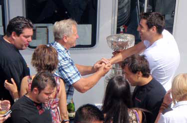 Milan Lucic and the Stanley Cup greeting family and guests aboard the 'Harbour Princess'.