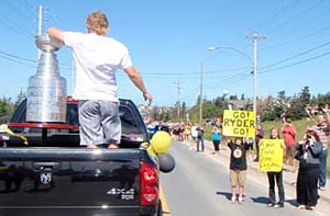Fans cheering on Michael Ryder and the Stanley Cup during a parade in Bonavista, Newfoundland.