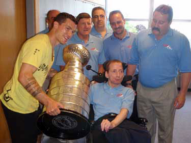 Andrew Ference and the Stanley Cup spending some at the Spaulding Rehabilitation Hospital