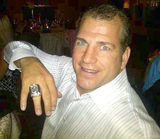 Mark Recchi showing off his Boston Bruins Stanley Cup ring.