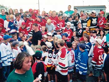 A blur of kids from local minor hockey organizations lined the streets of New Glasgow wearing their sweaters as a show of pride towards Colin White.