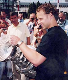 Jiri Bicek poses with the Cup for onlookers in Kosice, Slovakia.