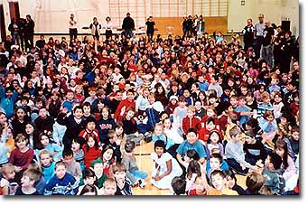 The Stanley Cup nestled amidst a school full of hockey fans.