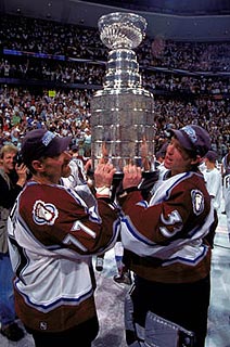 Roy helped Ray Bourque realize his dream of hoisting the Stanley Cup in 2001.