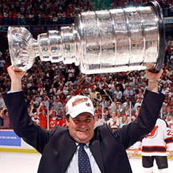 As head coach of the New Jerseys Devils, Burns led the club to the Stanley Cup Championship in 2003.