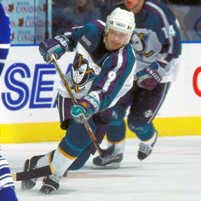 NHL99: Paul Kariya, dog on his chest, feet in water, is content away from  hockey - The Athletic