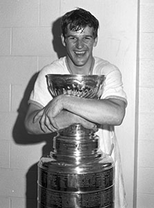 Bobby Orr poses with the Stanley Cup following the Bruins win