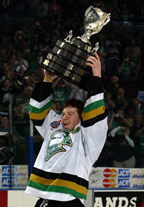 Captain Danny Syvret #25 of the London Knights hoists the Memorial Cup at the John Labatt Centre, London, Ontario. The London Knights defeated the Rimouski Oceanic 4-0 to win the Memorial Cup.