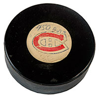 Puck used by Jean Beliveau of the Montreal Canadiens to score his 450 career NHL goal