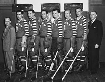 1949 First All-Star team - Coach Tommy Ivan, Maurice Richard, Sid Abel, Jack Stewart, Bill Durnan, Bill Quackenbush, Roy Conacher, NHL President Clarence Campbell.
