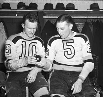 Bill Cowley #10 and Dit Clapper #5 of the Boston Bruins.