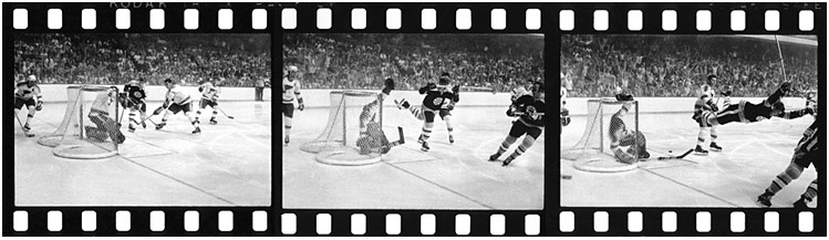 Boston Bruins Bobby Orr scoring the 1970 Stanley Cup overtime game-winning goal against the St. Louis Blues.