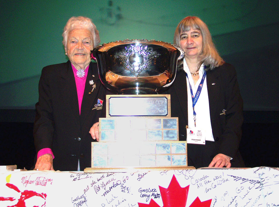 Hazel McCallion and Fran Rider pose with the Hazel McCallion Cup, the trophy awarded at the first unsanctioned Women's World Championship.