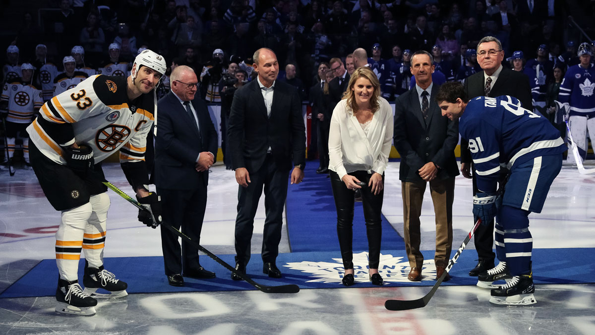 The Class of 2019 takes part in the ceremonial puck drop at the 2019 Hockey Hall of Fame Game.